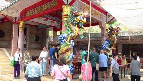 group of people participating in a temple ritual