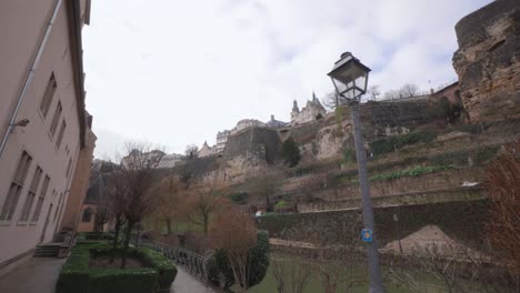 Wide-low-angle-shot-of-the-Saint-Michael-Cathedral,-Grund-Luxembourg-seen-from-below