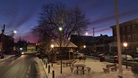 snow covered town in usa during sunset time