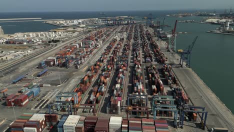 aerial view of valencia, spain, big shipping cargo terminal containers port, sunny summer