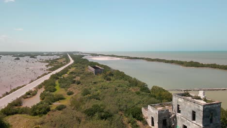 abandoned structure inside yucatan mangrove seen from a drone