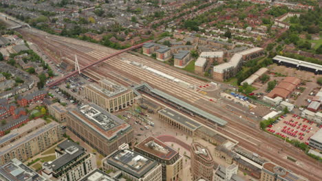 Circling-aerial-shot-over-Cambridge-station-Entrance