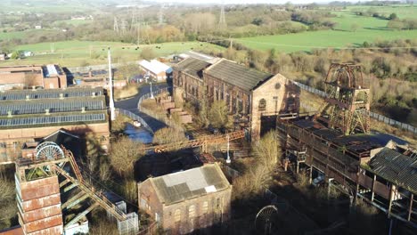 abandoned run down staffordshire historical industrial coal mine buildings aerial view