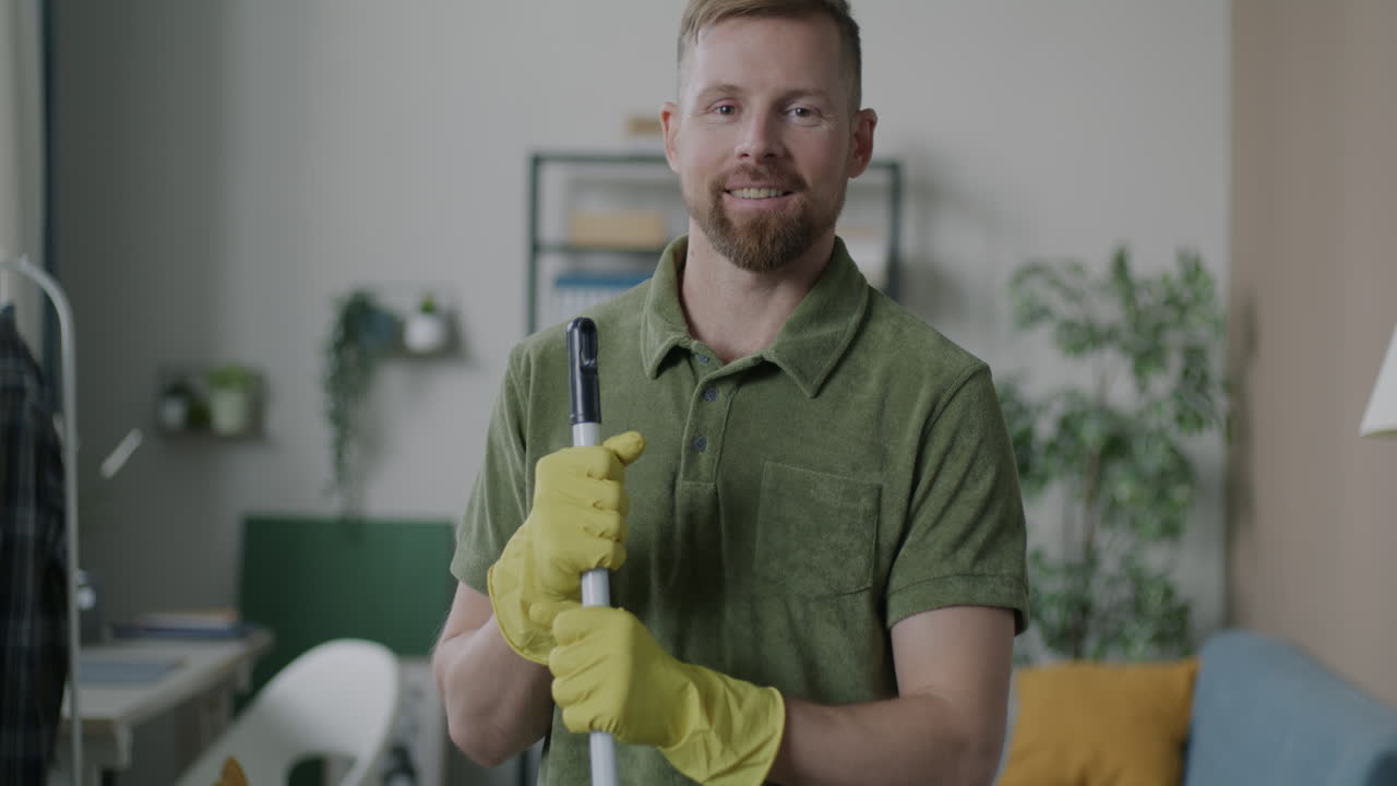 Man cleaning his home