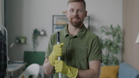 man cleaning his home