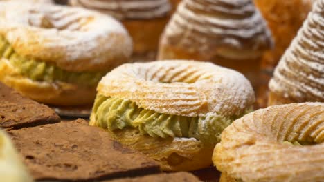 closeup of delicious pastries on display at a bakery