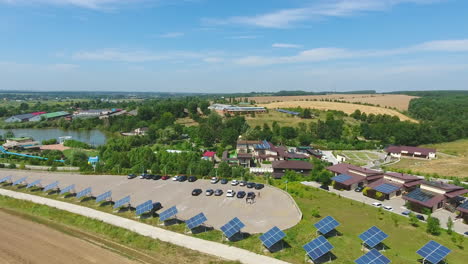 well-organized rural territory for green tourism and rest. houses and lawns equipped with solar panels. spa resort area. view from above.