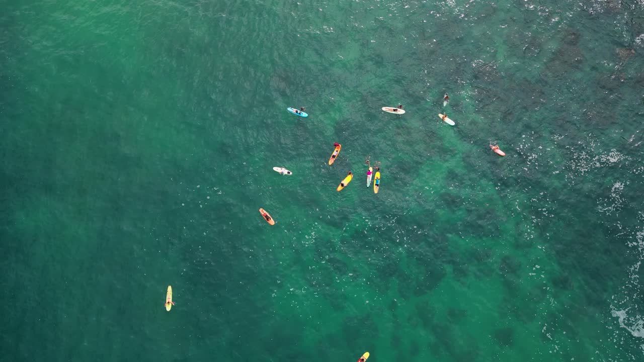Above the swell, drone's view of surfing action in Carrizalillo beach at Puerto Escondido, Oaxaca, Mexico