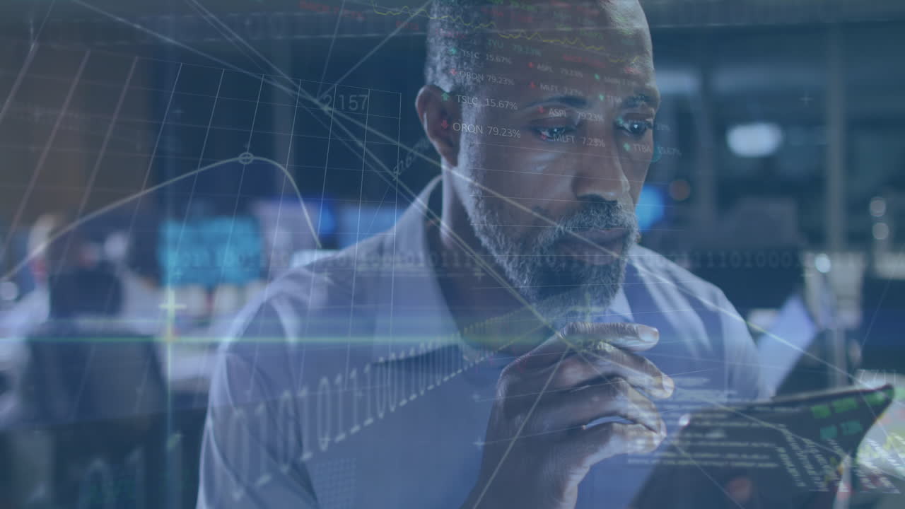 Animation of data processing over african american businessman using tablet