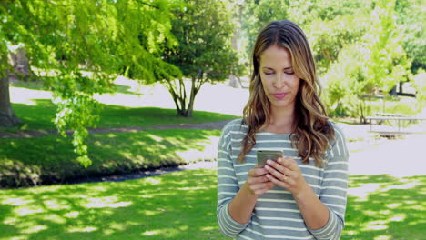 Woman-using-her-smartphone