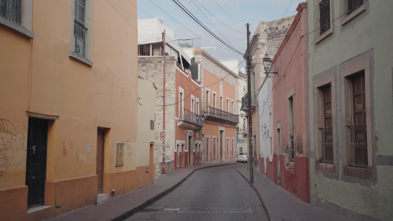 Street view of a historic town with colorful buildings