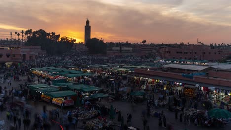 sunset over the djemaa el-fna marketplace in marrakech, morocco