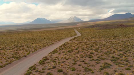 distancing a beautiful desert road from volcanoes