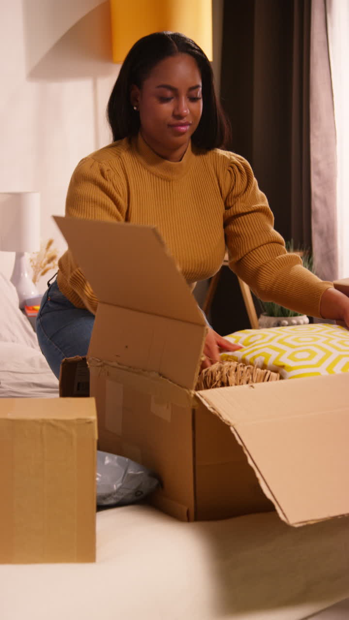 Woman Unpacking Boxes at Home