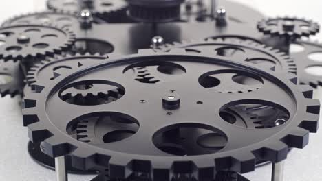 close up shot of  black gear cogs rotating