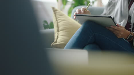 close-up-business-woman-hands-using-digital-tablet-computer-in-office-browsing-internet-working-online-typing-email-networking-on-mobile-pc