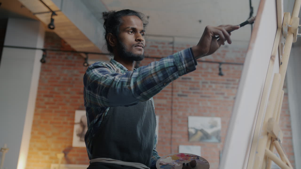 Artist Painting in Studio