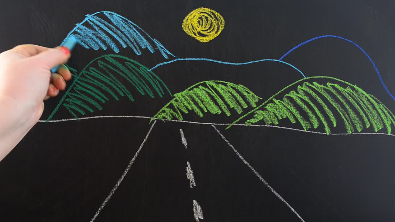 Road to mountains. We draw chalk on a board