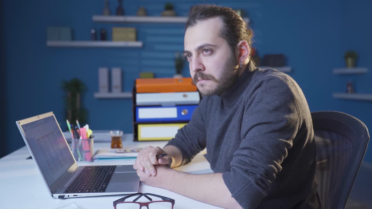 Stressed and worried businessman thinking.