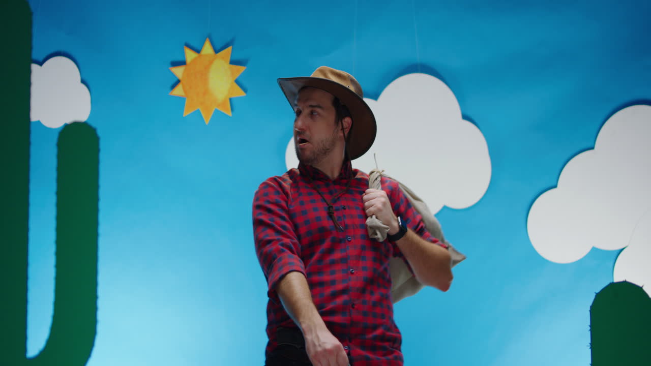 Cowboy with a Bag in a Cartoon Desert Landscape