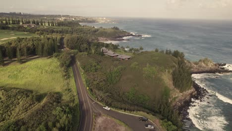 aerial showing the beautiful coastline of maui, hawaii during a warm sunset