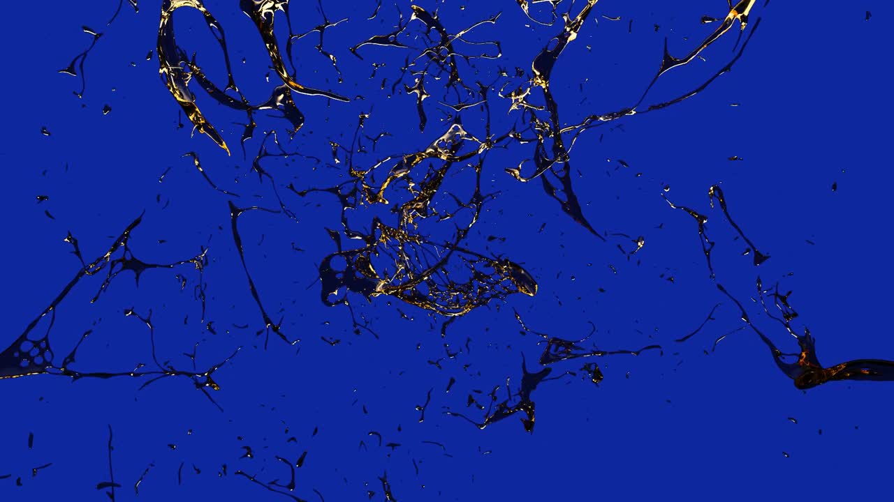 슬로우 모션으로 튀는 금색 액체