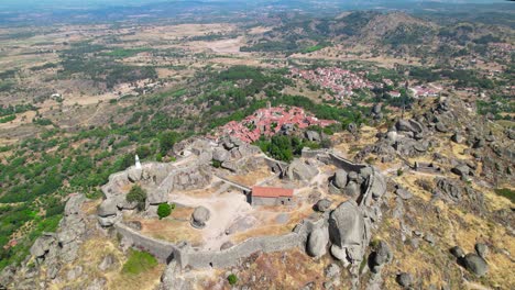 drone shot vilage of monsanto in portugal