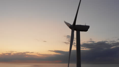 Windturbines-during-sunset-on-the-island-Neeltje-Jans,-the-Netherlands