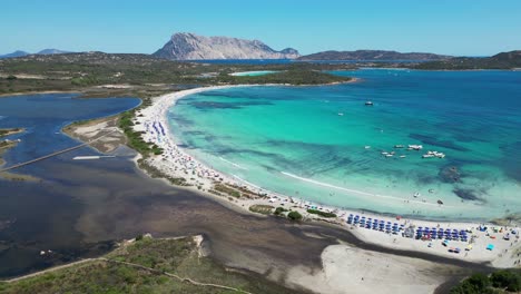 Sardinia,-Lu-Impostu-Beach-and-Salt-Lake-at-San-Teodoro---Aerial-4k-Circling