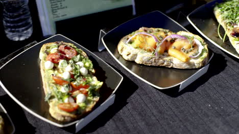 gourmet toast and bruschetta assortment at a food event