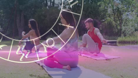 animation of horoscope zodiac wheel over diverse people practicing yoga