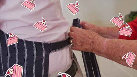 Animation-of-piece-of-cakes-over-hands-of-caucasian-senior-woman-tying-apron