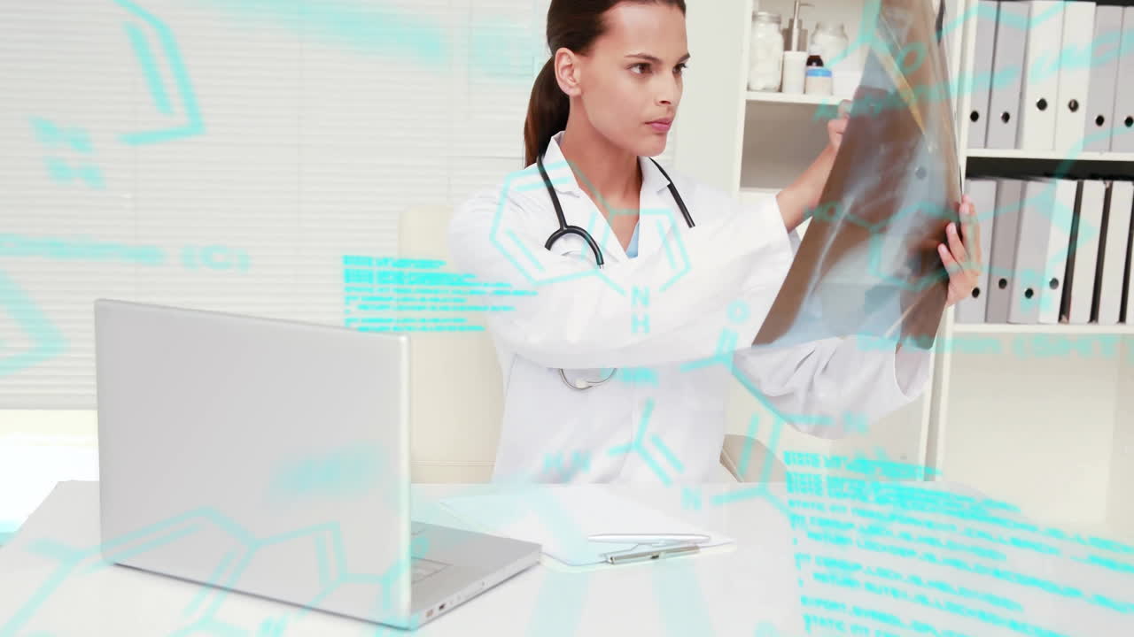 Animation of blue data processing over biracial female doctor working at desk with x ray and laptop