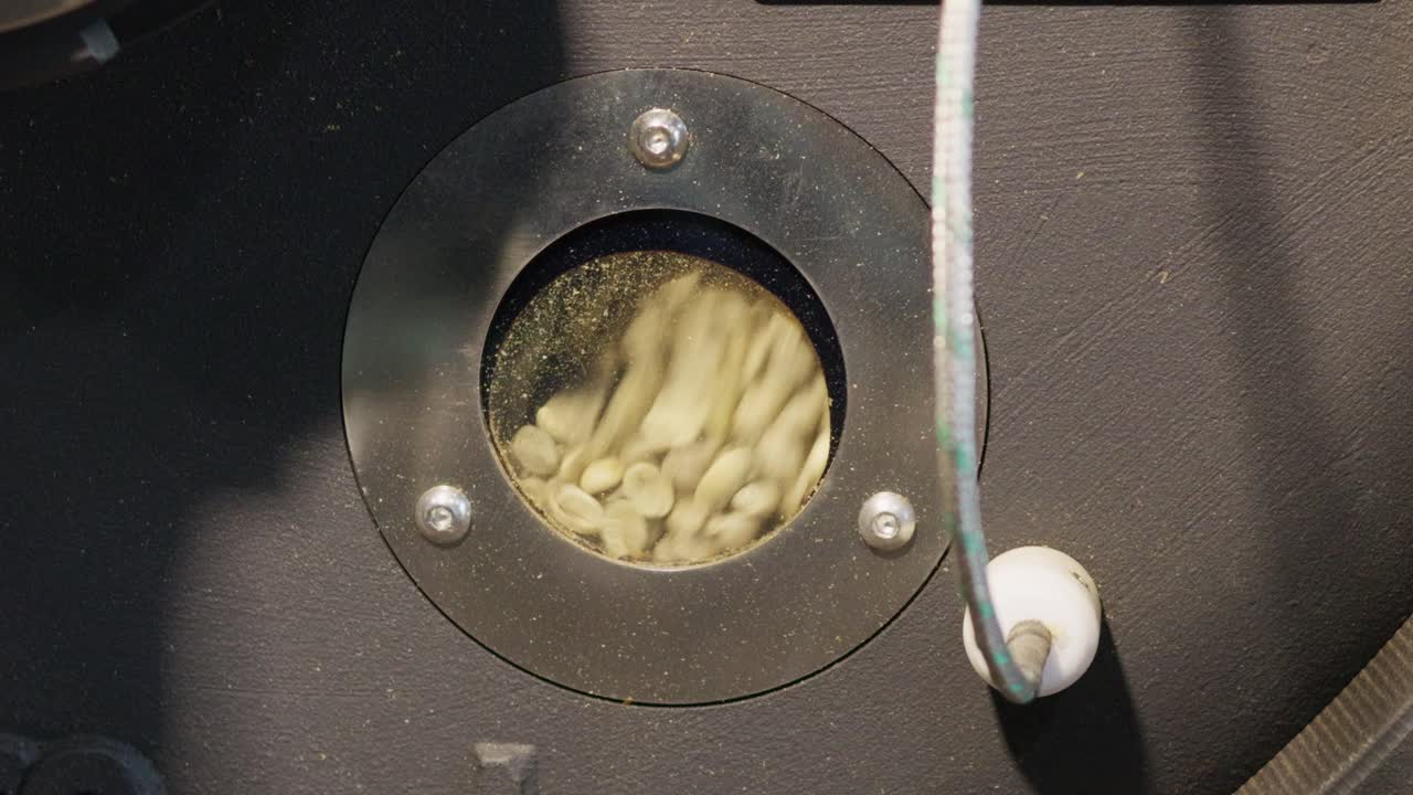 Discover the intricate coffee roasting process in a vibrant artisan workshop.