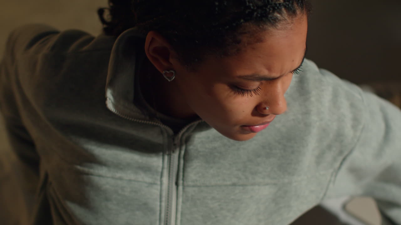 Teenager using smartphone in bed at night
