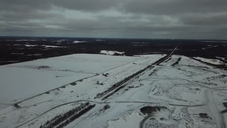 Vast-forest-and-old-town-landscape-in-Canada-Oil---Drone-4k-Aerial