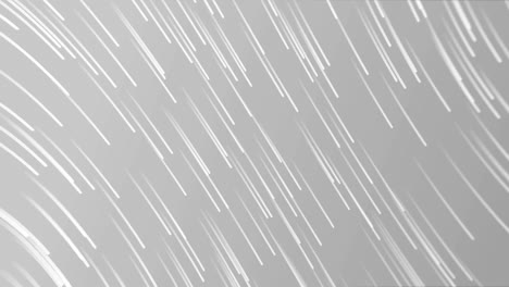 animation of glowing lights trail against grey background