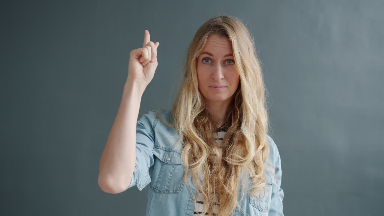 Woman Pointing Finger Up