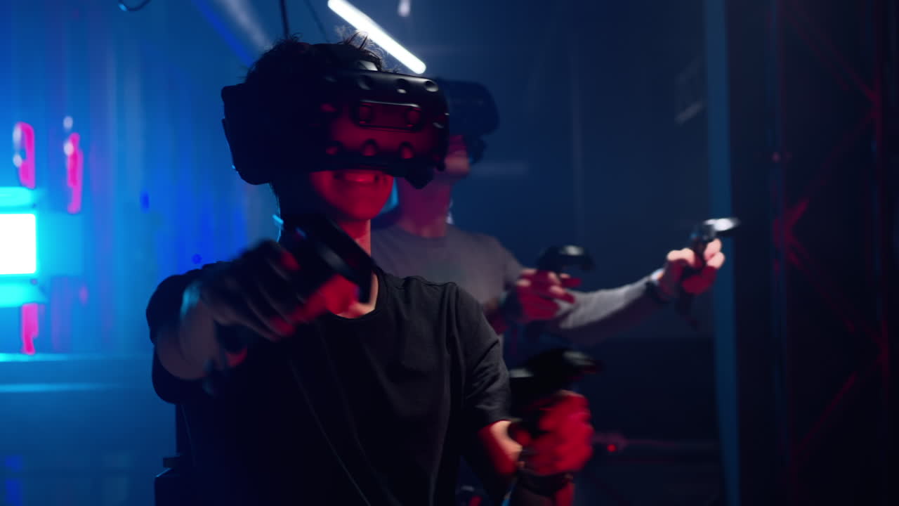 Boys playing with a Virtual Reality headset in a studio