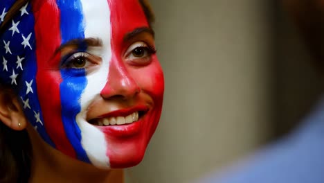 woman with american flag face paint