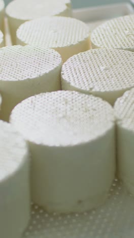 stacked rounds of white cheese