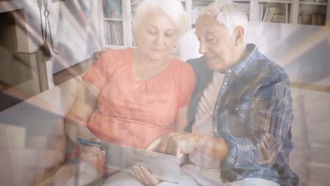 Caucasian-senior-couple-in-social-distancing-buying-online-at-home