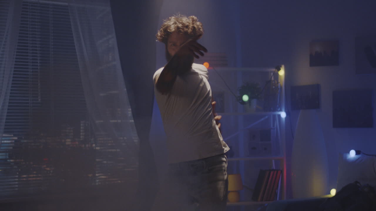 Man Dancing in a Night Bedroom