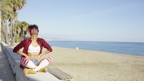 sexy fashionable young woman at the seaside