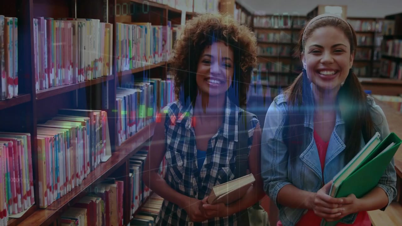 Two students browsing books and laughing in library, camera zooming, overlay partly obscuring them