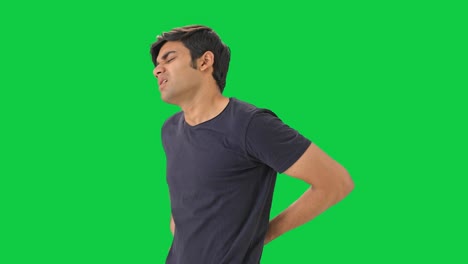 Young-Indian-boy-having-back-pain-Green-screen