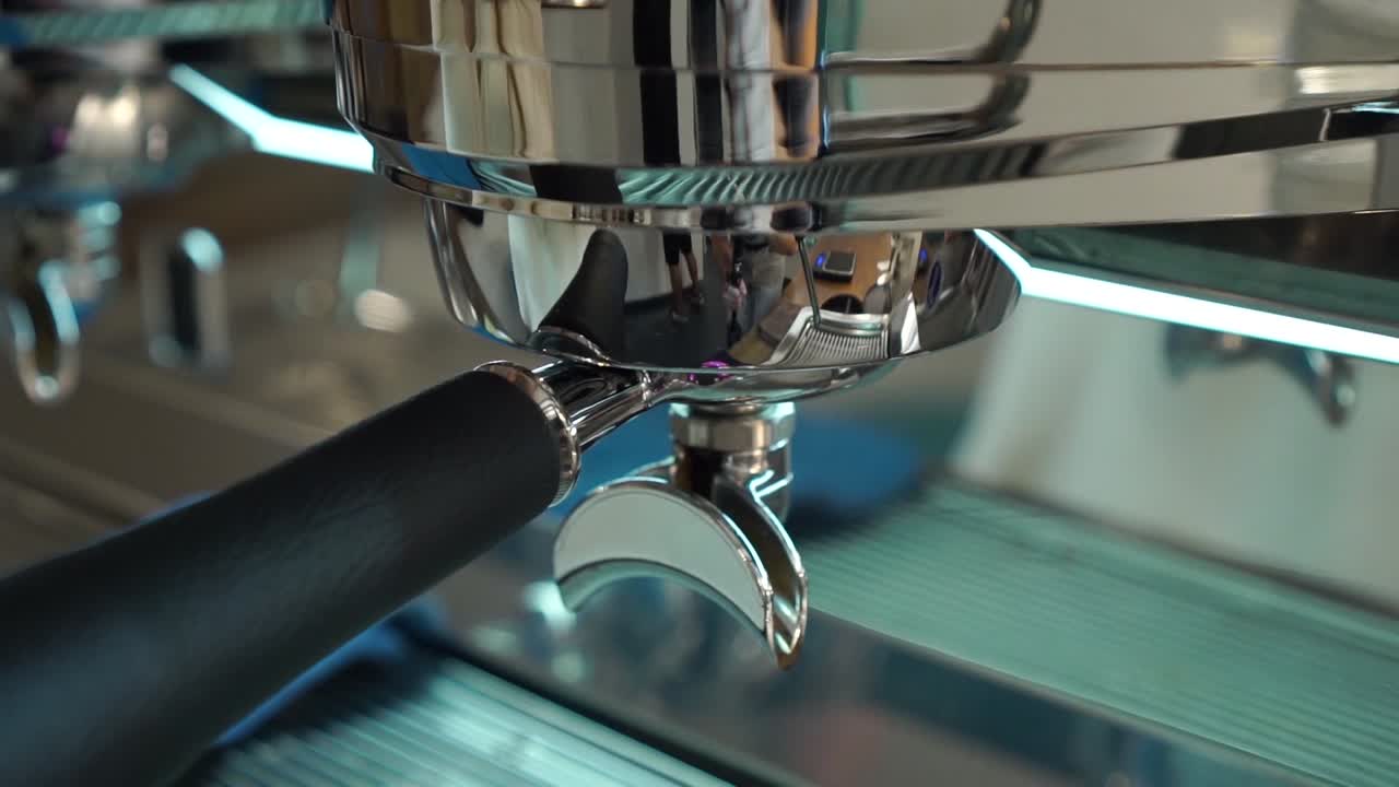 SLOWMO - Professional female barista prepares two porcelain cappuccino cups of espresso