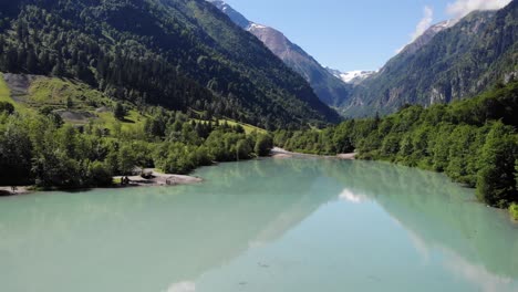 Klammsee---Mountain-Water-Reservoir-Above-Kaprun-Town-With-Turquoise-Blue-Water-In-Austria---aerial-drone-shot