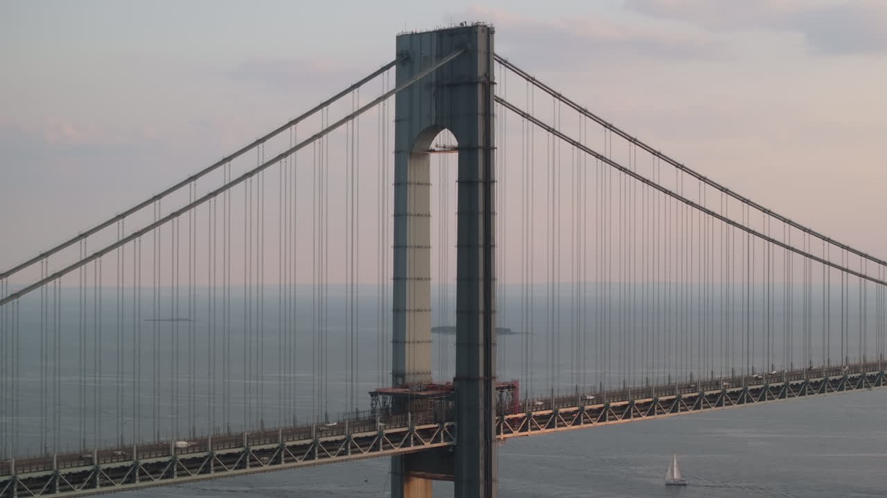 Aerial view of the Verrazzano-Narrows Bridge at dusk. Shot in Brooklyn, New York on a summer day