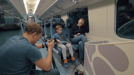 stocker making footage of family train journey